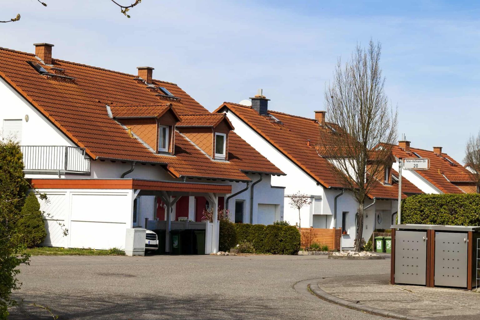 classic-german-residential-houses-with-orange-roofing-tiles-and-windows.jpg